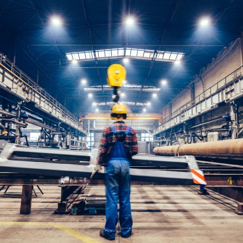 blue-collar-worker-operating-crane-hook-in-a-big-factory-.jpg blue-collar-worker-operating-crane-hook-in-a-big-factory-.jpg